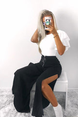 Black Zip Front High Waisted Flare Trousers - Gerta
