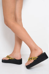 Yellow Slogan tape Platform Flip Flops - Zyriana