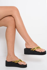 Yellow Slogan tape Platform Flip Flops - Zyriana