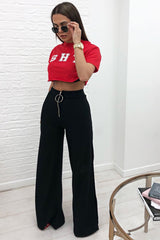 Black Zip Front High Waisted Flare Trousers - Gerta