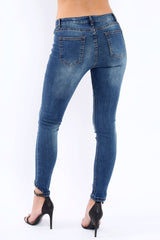 Blue Denim Stud And Eyelet Ring Dip Hem Skinny Jeans - Lesha
