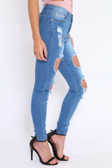 Light Blue Distressed Extreme Cut Out Skinny Jeans - Lilie