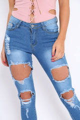 Light Blue Distressed Extreme Cut Out Skinny Jeans - Lilie