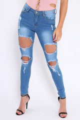 Light Blue Distressed Extreme Cut Out Skinny Jeans - Lilie