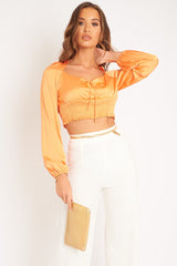 Orange Shirred Long Sleeve Strap Back Detail Crop Top -Traniyah