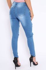 Light Blue Distressed Extreme Cut Out Skinny Jeans - Lilie