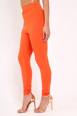 Orange Tapered Trousers With Gold Buckle - Zyana